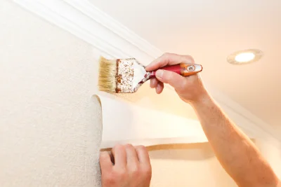 Pose de papier peint à la Courtète — revêtements muraux et toiles de verre